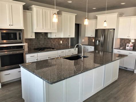 white kitchen cabinets steel grey granite countertops|farmhouse countertops with white cabinets.